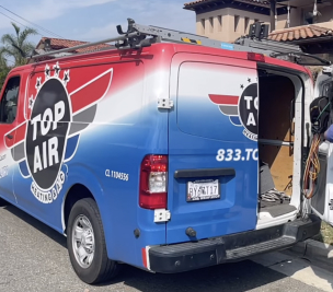 red white and blue van with the back open